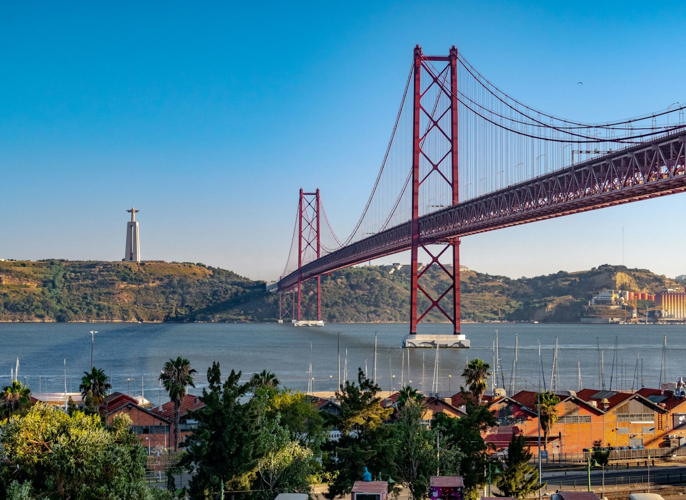 25 de Abril Bridge and Cristo Rei over the Tagus River, Lisbon